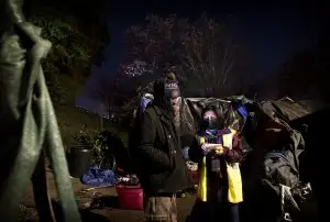 Rocknie Simon who is experiencing homelessness, takes a survey with Lourdes Castro Ramirez on X Street during the Homeless Point-In-Time (PIT) Count on Feb. 24, 2022. Ramirez is the Secretary of the California Business, Consumer Services & Housing Agency.