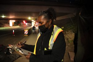 Tamara Knox collects photo releases at the Homeless Point-In-Time (PIT) Count on Feb. 24, 2022